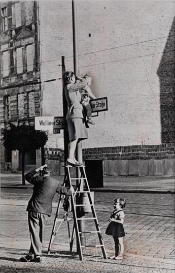 (THE BERLIN WALL--EAST & WEST GERMANY) A group of 50 press photographs, with 20 relating to the Berlin Wall and 30 depicting daily life
